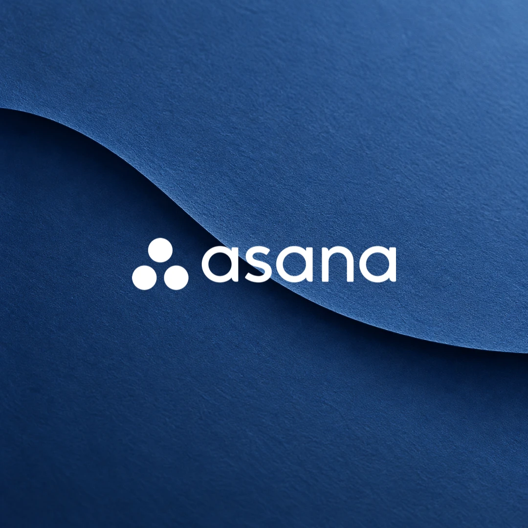 White Asana logo over a blue layered-paper texture.